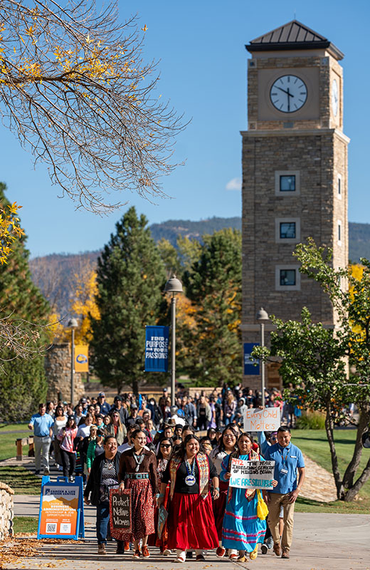 Students and community members march for indigenous rights at the Clocktower on Fort Lewis College's campus.